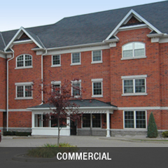 Red three storey building with grey roof. Click here to view the commercial projects section of the architectural portfolio